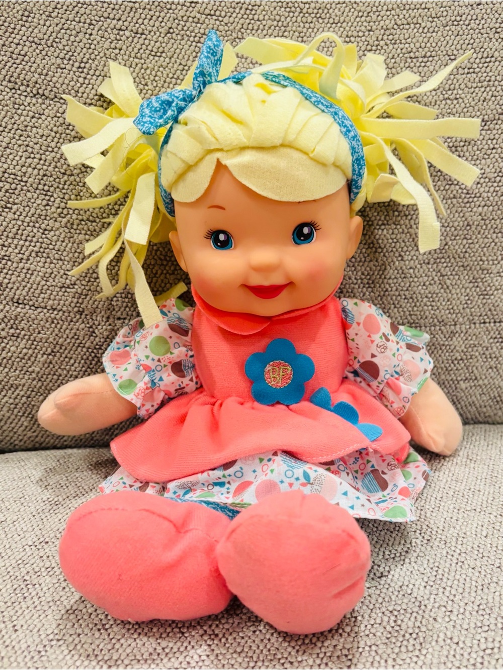 Plush Baby Doll in Coral Dress with Yellow Hair and Blue Headband
